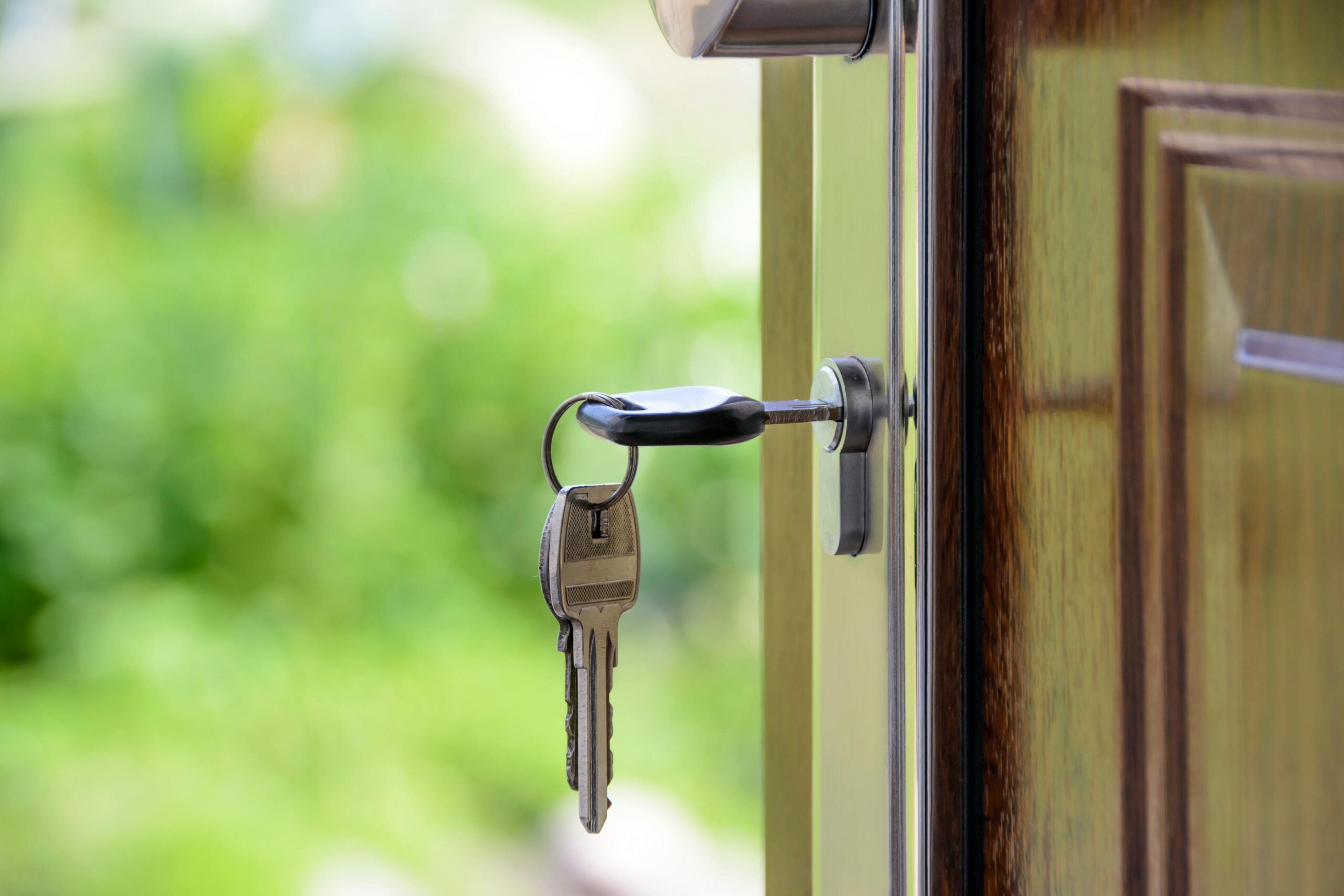 Key in door that is slightly ajar